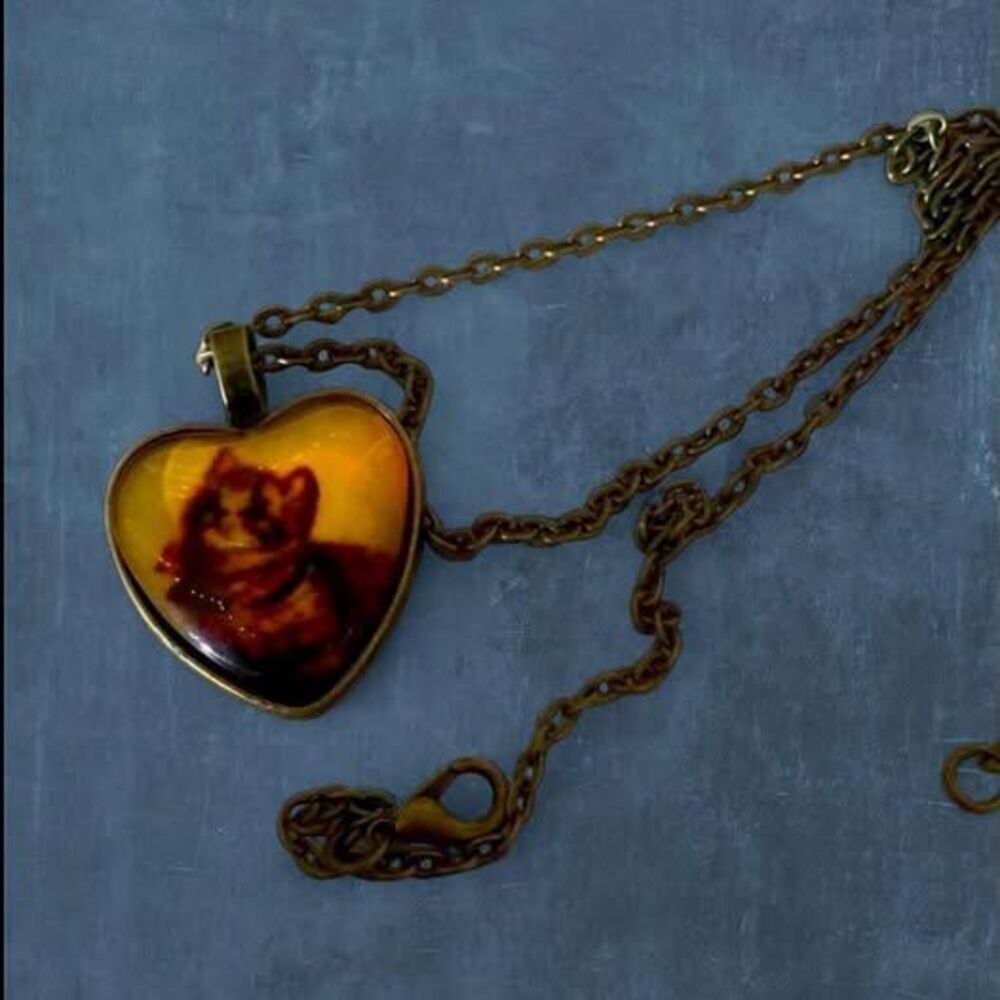 whimsical antique style coquette cat necklace with heart pendant